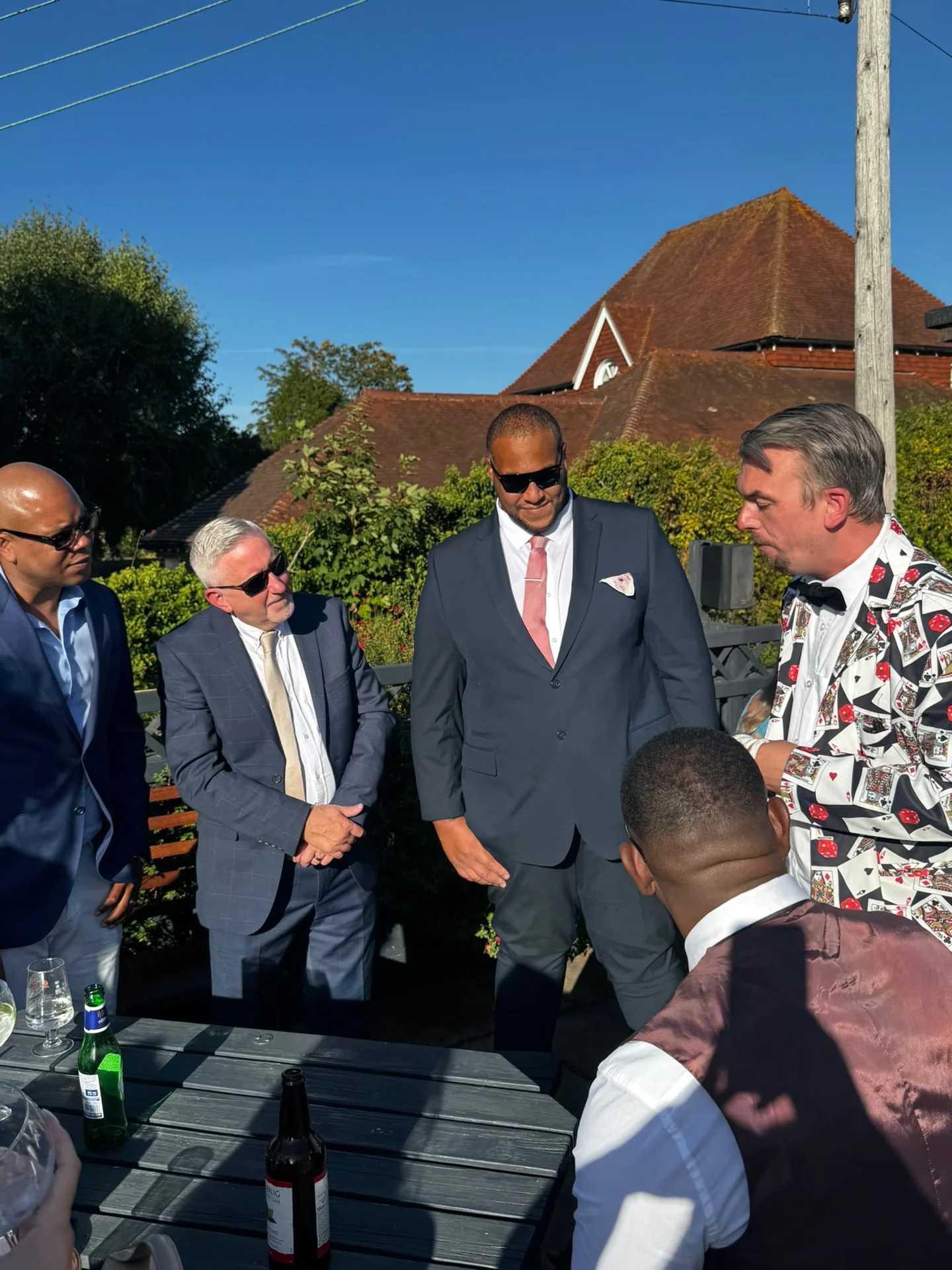 Ash Trix performing close-up magic for guests outdoors