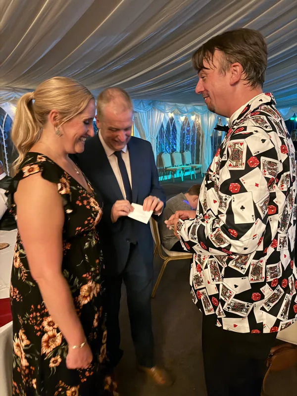 Close-up magic at a wedding reception.